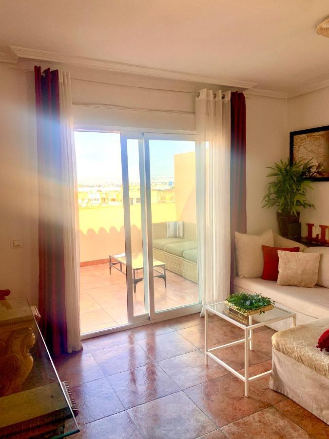 ÁTICO DELUXE entre CENTRO y PLAYA Salinas con TERRAZA, WIFI, PISCINA climatizada, GYM, SAUNA y GARAJE -Smart TV Roquetas de Mar Exterior foto