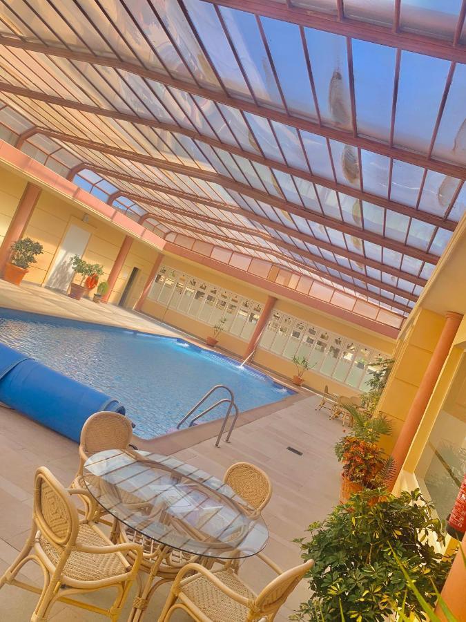 ÁTICO DELUXE entre CENTRO y PLAYA Salinas con TERRAZA, WIFI, PISCINA climatizada, GYM, SAUNA y GARAJE -Smart TV Roquetas de Mar Exterior foto